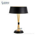 https://www.bossgoo.com/product-detail/gold-lampshade-black-gold-metal-table-63001552.html